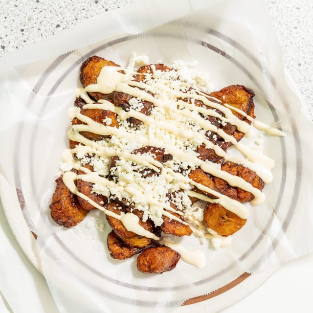 Platanos Fritos Queso Y Crema (Sour Cream and cheese).